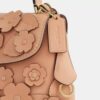Emory-tas met handvat en bloemenapplicatie
