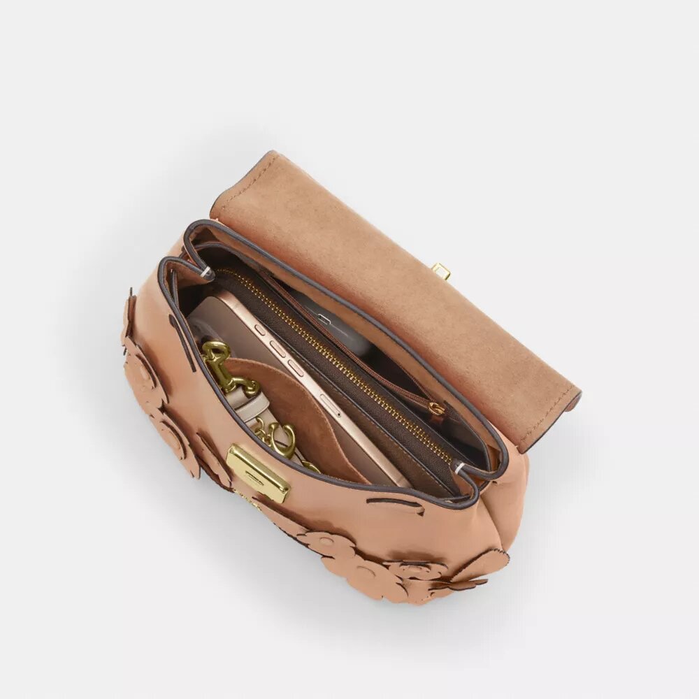 Emory-tas met handvat en bloemenapplicatie