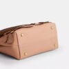 Emory-tas met handvat en bloemenapplicatie