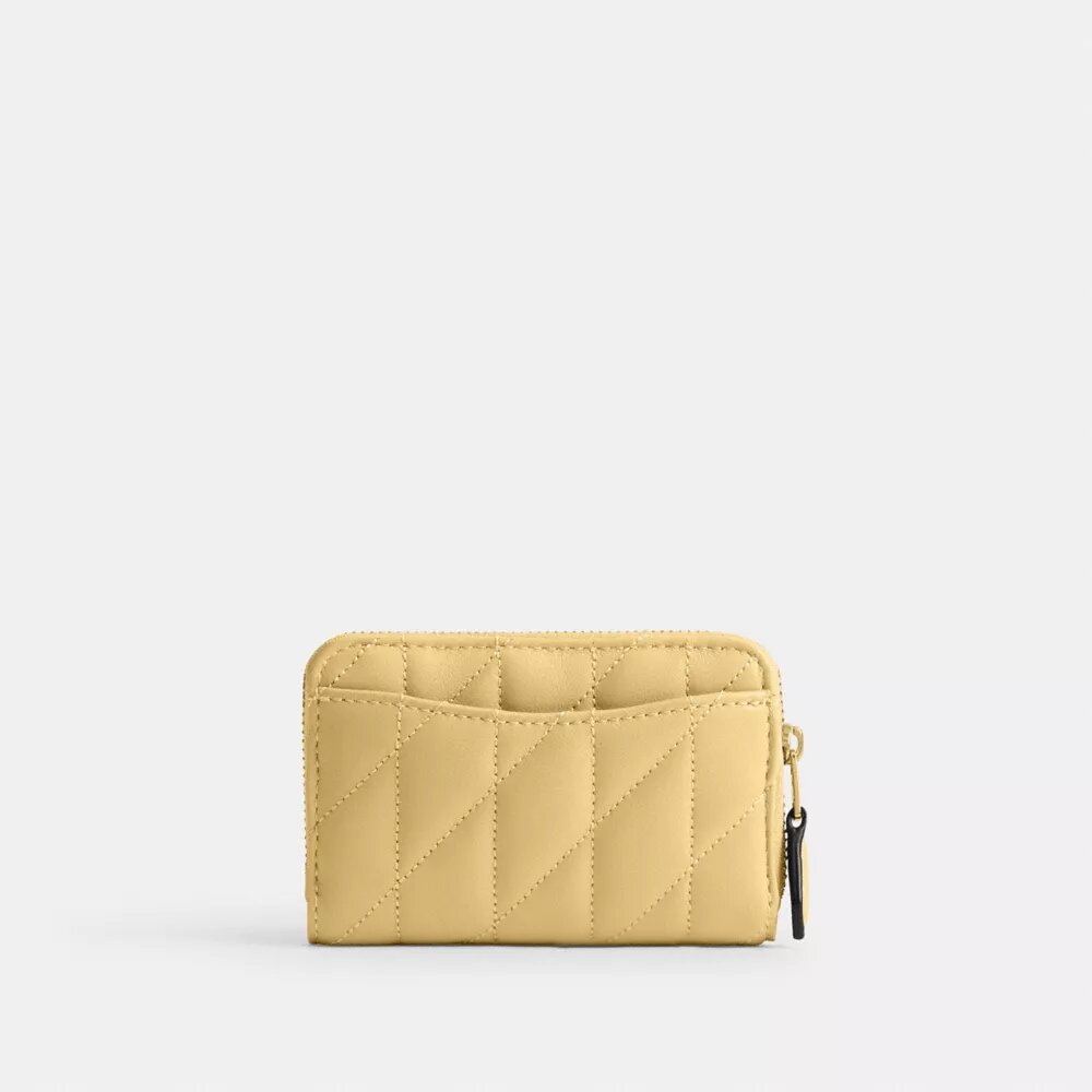 Essentiële kleine kaarthoes met rits rondom en kussenquiltpatroon