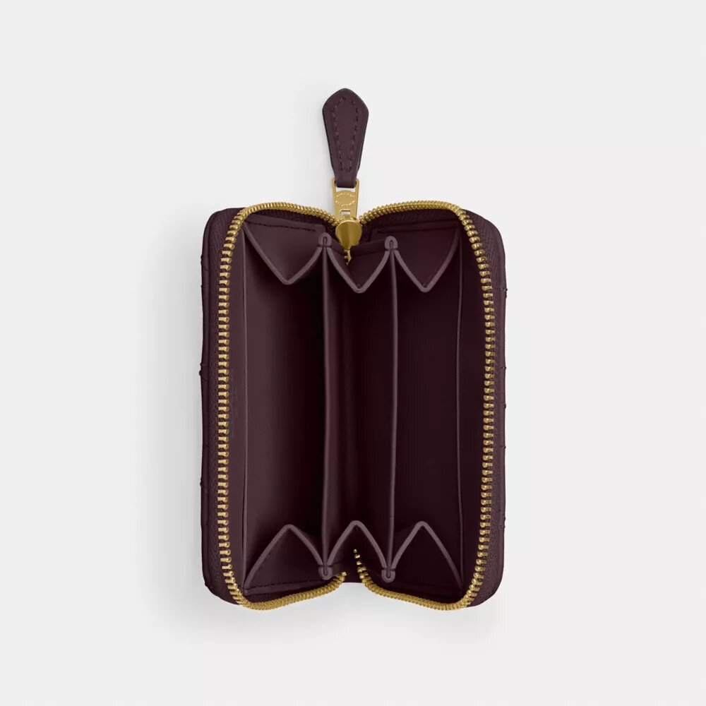 Essentiële kleine kaarthoes met rits rondom en kussenquiltpatroon