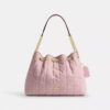 Evelyn-schoudertas in ‘Loved Denim’ met doorgestikt patroon en bedels