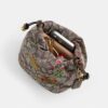 Faye Minitas met trekkoord in kenmerkend jacquard met bloemenborduursel