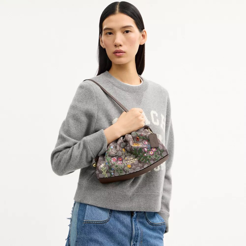 Faye-schoudertas in kenmerkend jacquard met bloemenborduursel