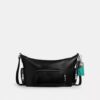 Finn-crossbodytas met vakken en bedels