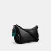 Finn-crossbodytas met vakken en bedels