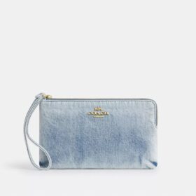 Grote polbandtasjes met rits in de hoek van ‘Loved Denim’