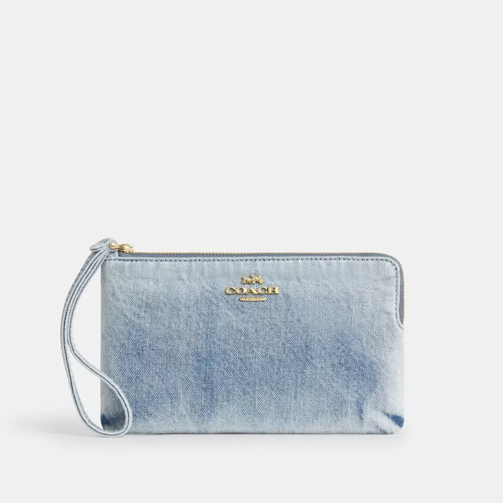 Grote polbandtasjes met rits in de hoek van ‘Loved Denim’