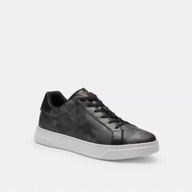 Hoge sneakers met kenmerkende camouflageprint