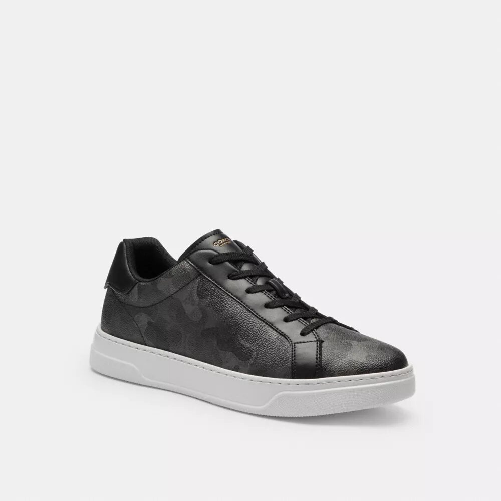 Hoge sneakers met kenmerkende camouflageprint