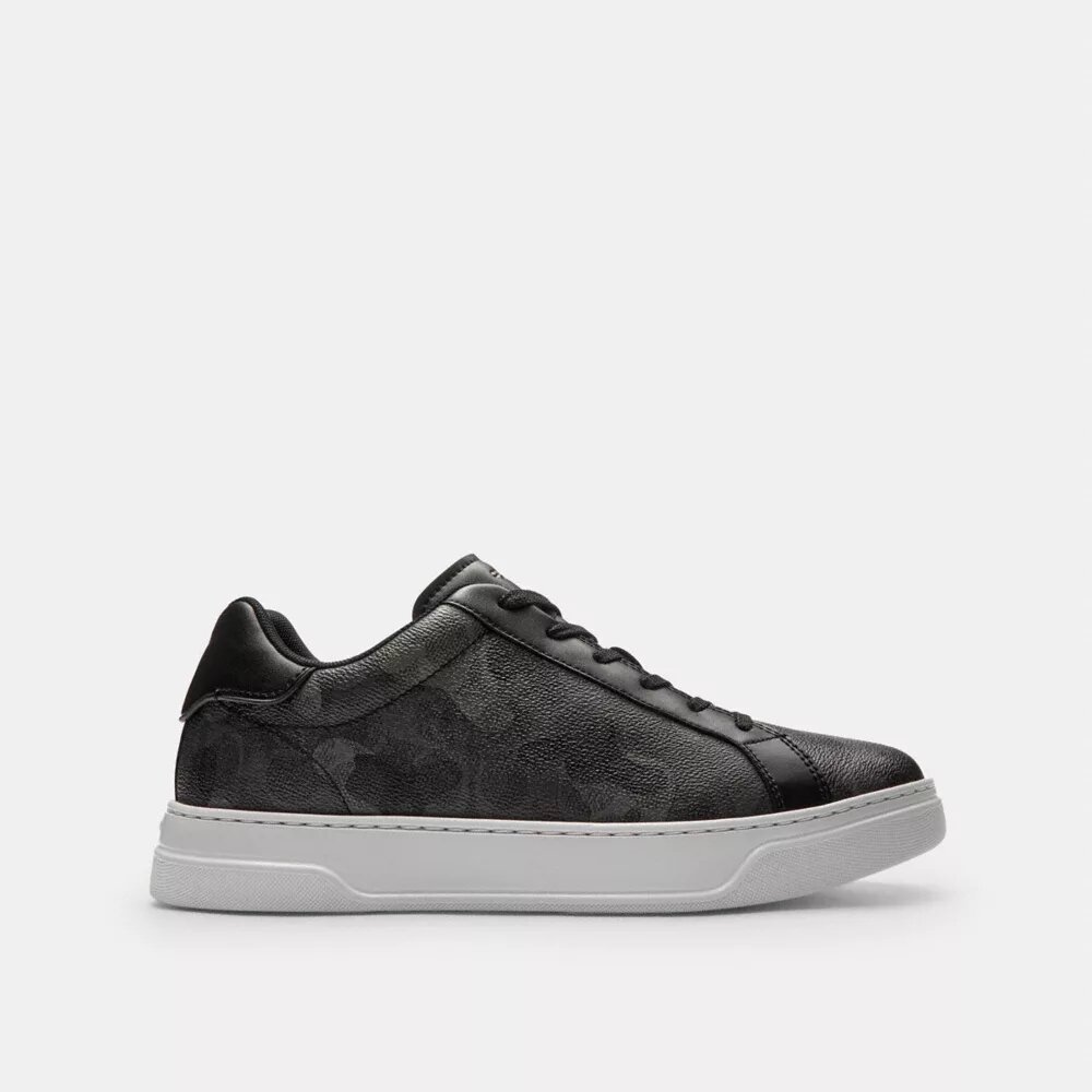 Hoge sneakers met kenmerkende camouflageprint