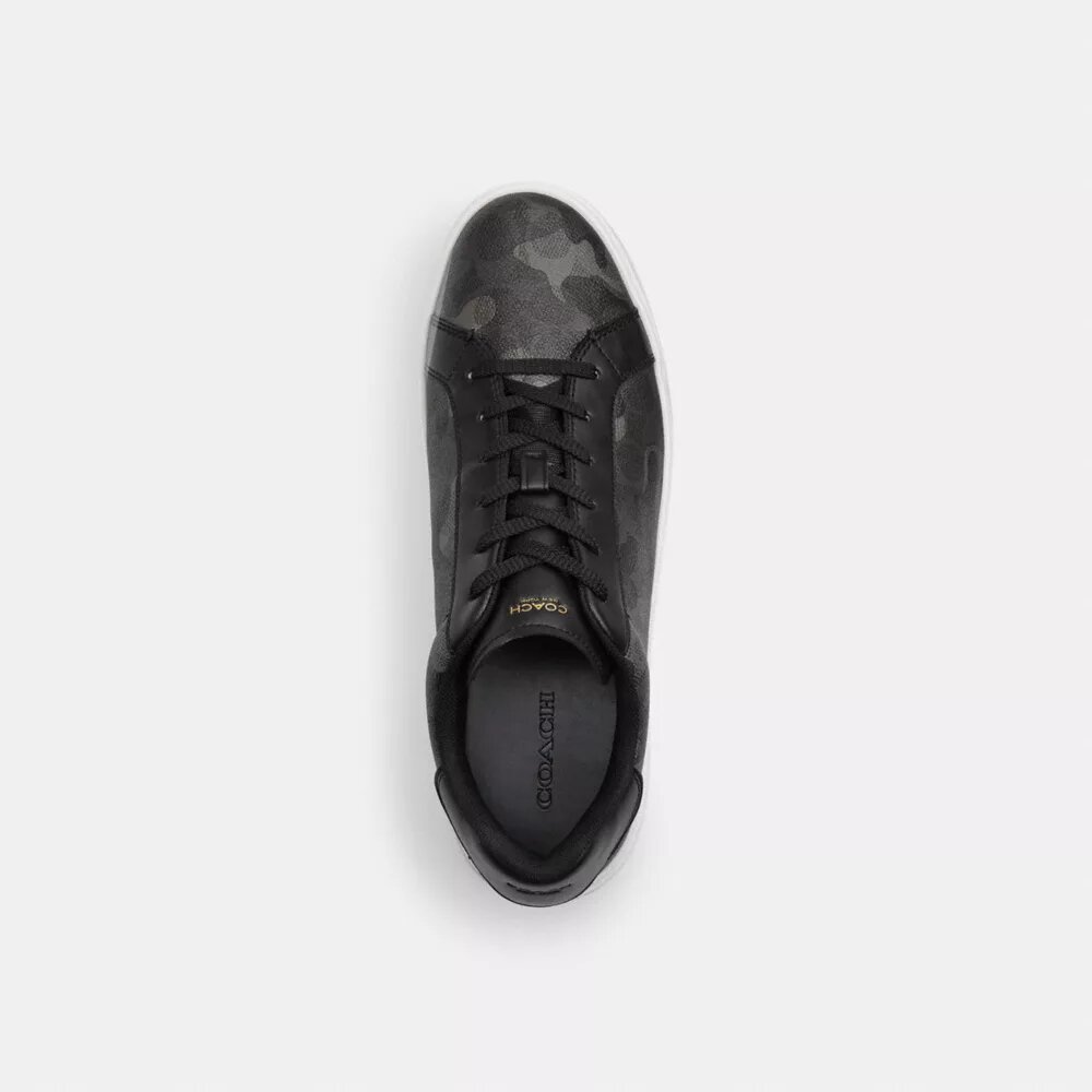 Hoge sneakers met kenmerkende camouflageprint