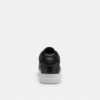 Hoge sneakers met kenmerkende camouflageprint