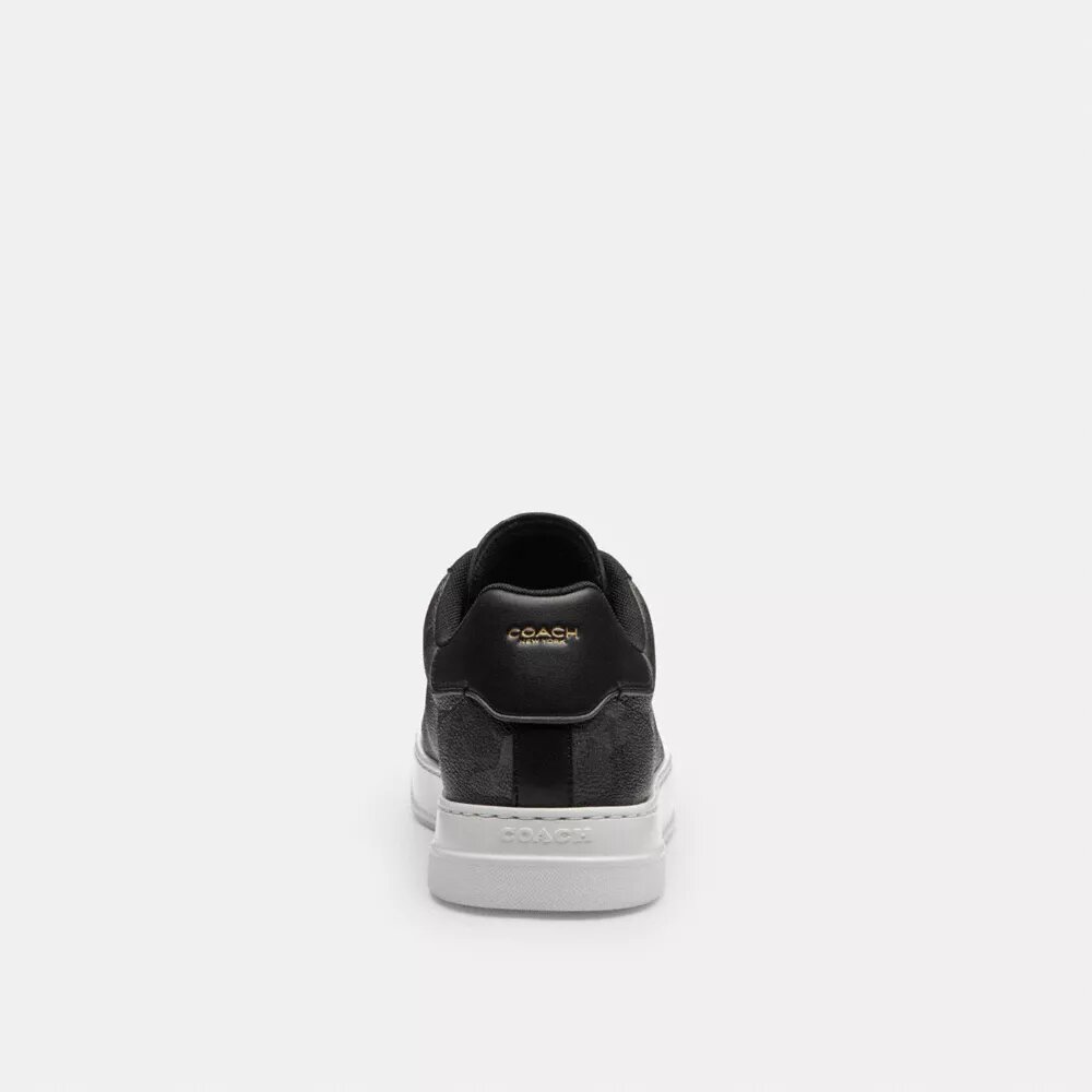 Hoge sneakers met kenmerkende camouflageprint
