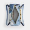Kisslock Barrel-tas 28 van hergebruikt denim