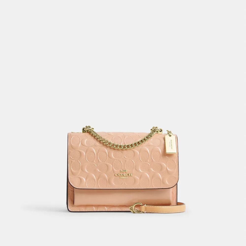 Klare crossbodytas van kenmerkend leer