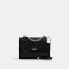 Klare crossbodytas van kenmerkend leer