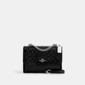 Klare crossbodytas van kenmerkend leer