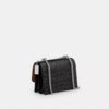 Klare crossbodytas van kenmerkend leer