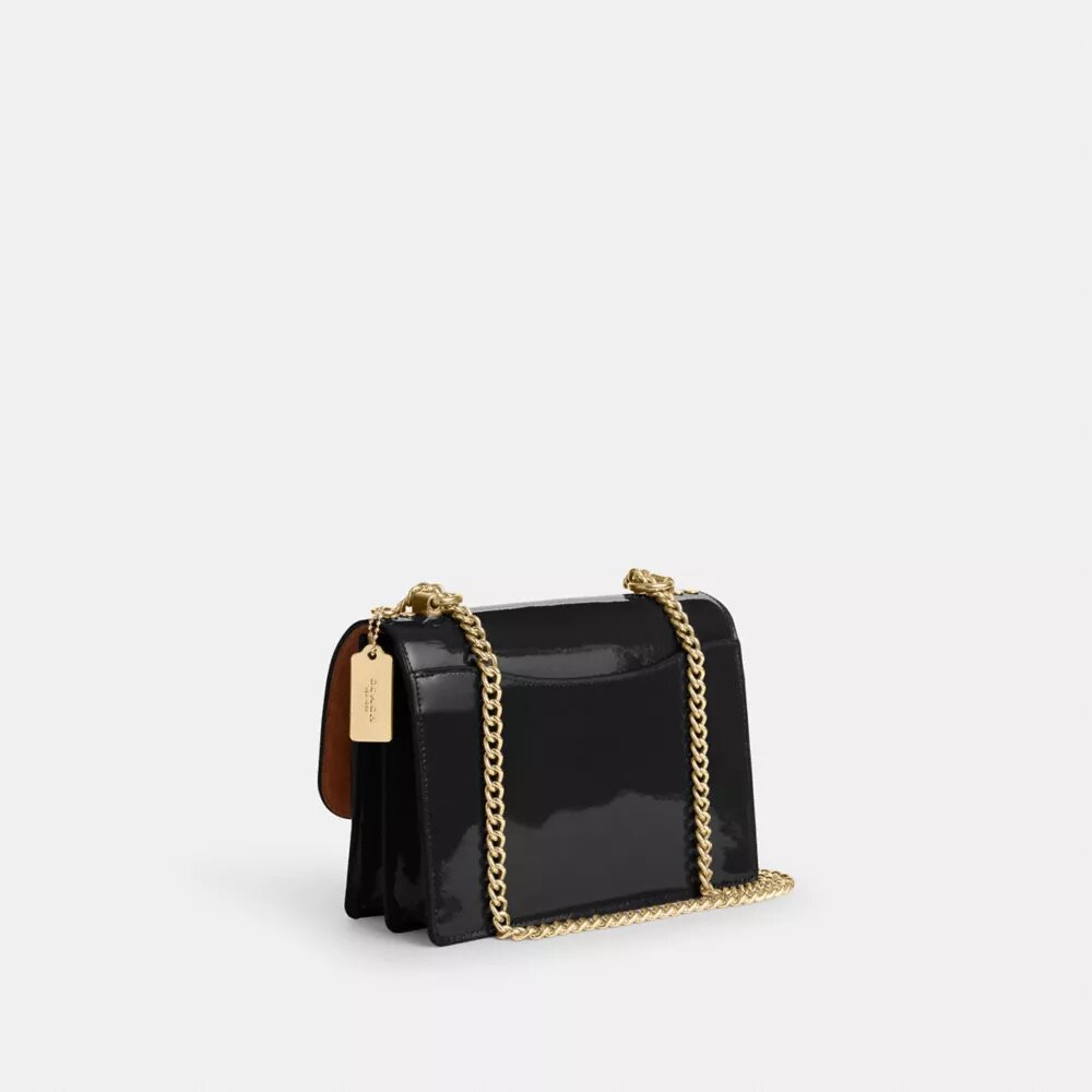 Klare crossbodytas van kenmerkend leer