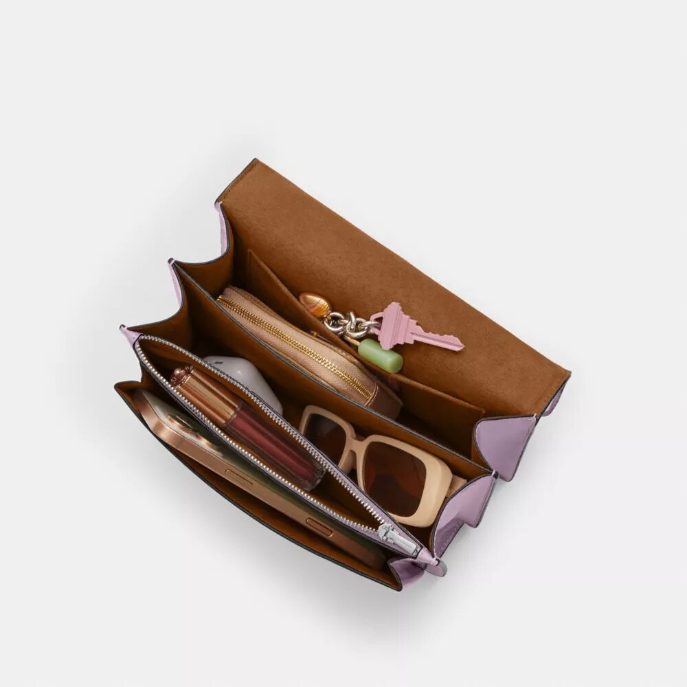 Klare crossbodytas van kenmerkend leer