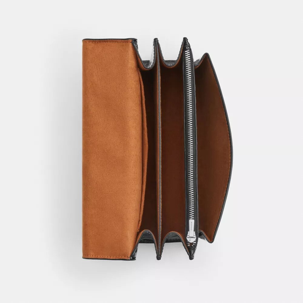 Klare crossbodytas van kenmerkend leer