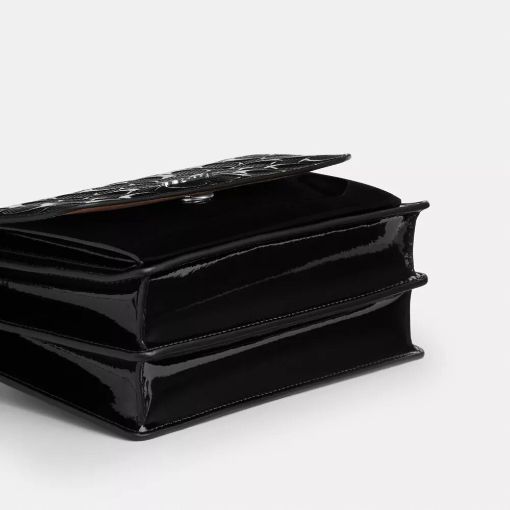 Klare crossbodytas van kenmerkend leer