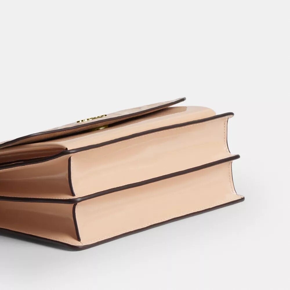 Klare crossbodytas van kenmerkend leer