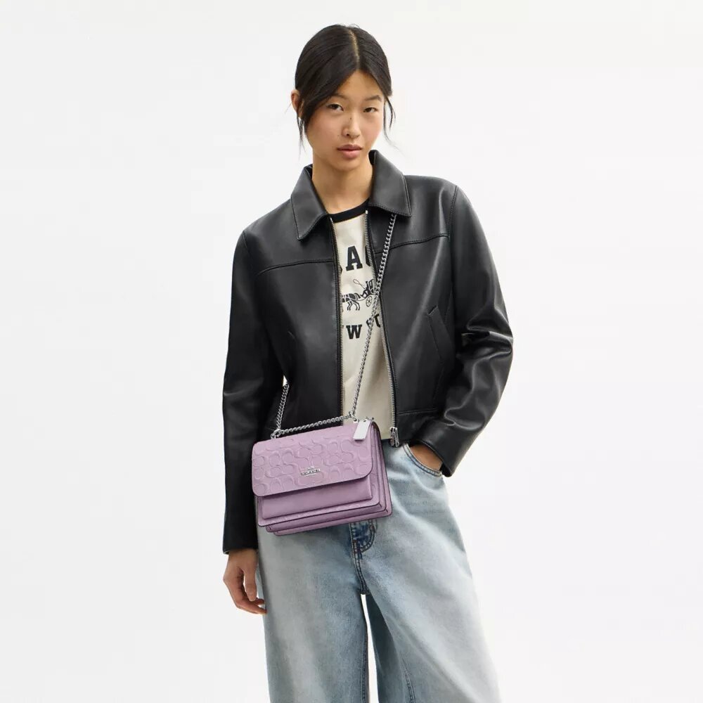 Klare crossbodytas van kenmerkend leer