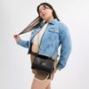 Klare crossbodytas van kenmerkend leer