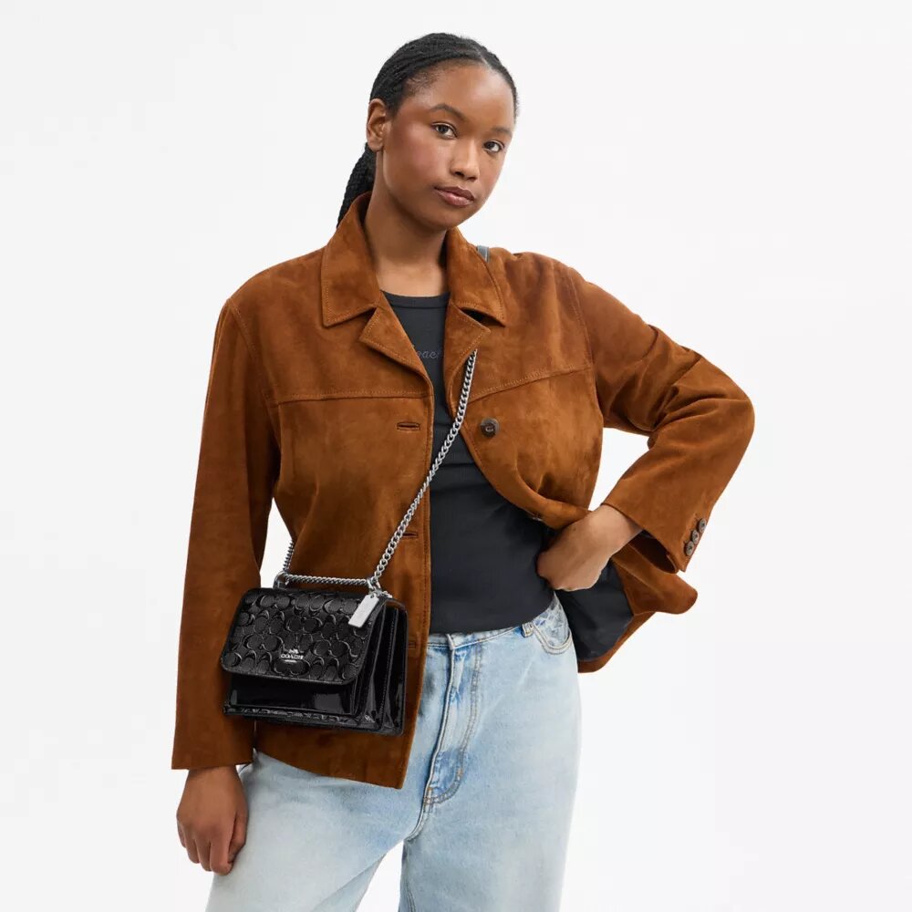 Klare crossbodytas van kenmerkend leer