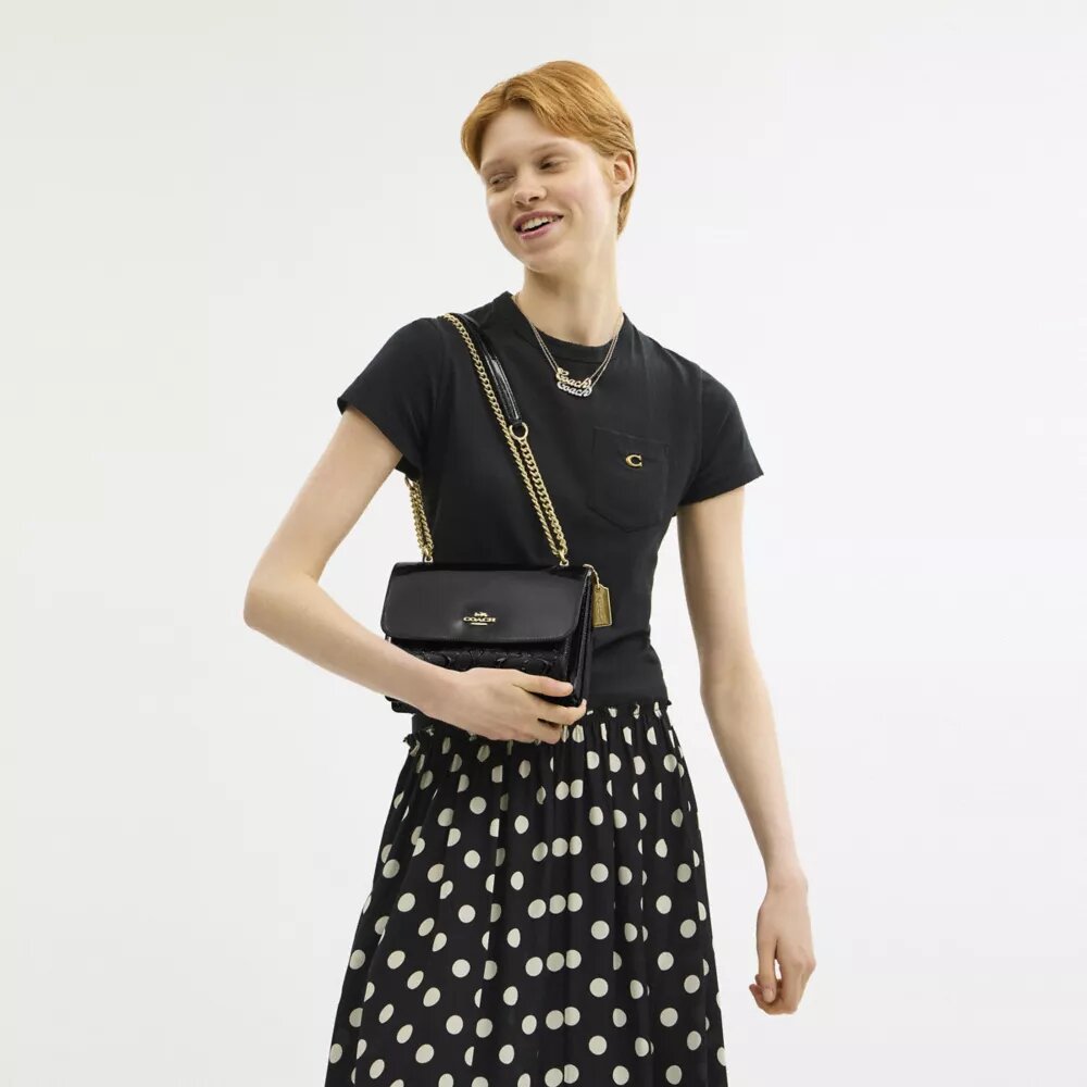 Klare crossbodytas van kenmerkend leer
