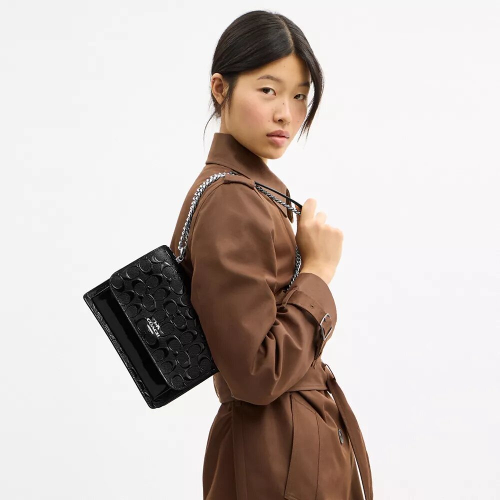 Klare crossbodytas van kenmerkend leer