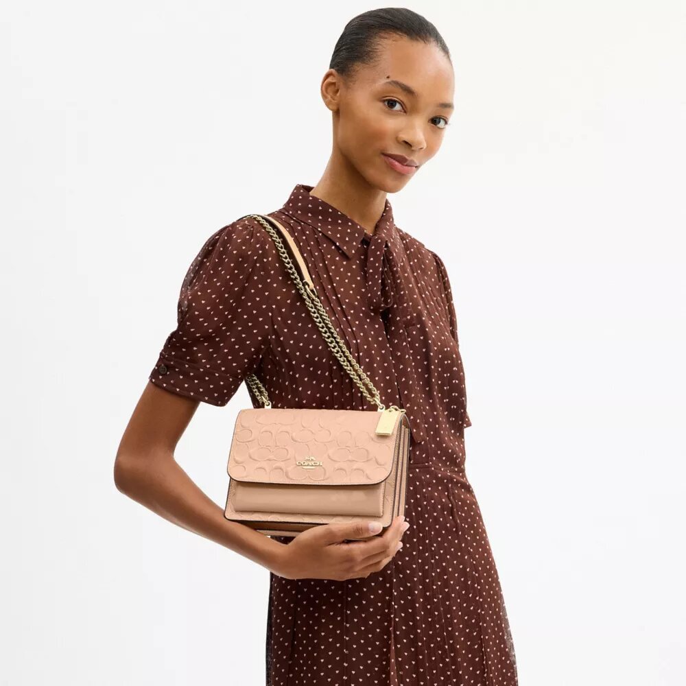 Klare crossbodytas van kenmerkend leer