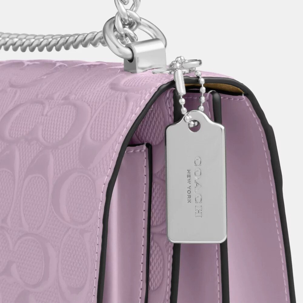 Klare crossbodytas van kenmerkend leer
