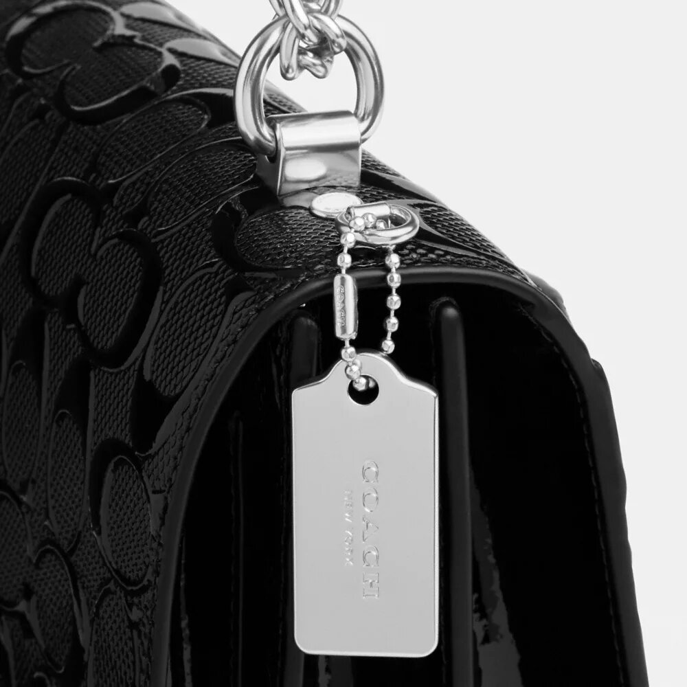 Klare crossbodytas van kenmerkend leer