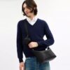 Kleine Finn-crossbodytas met zakje
