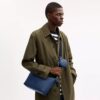 Kleine Finn-crossbodytas met zakje