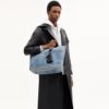Kleine 'Tour'-Tote bag van 'Loved Denim' met bedels