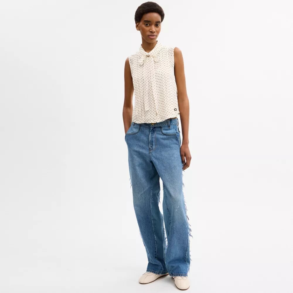 Korte mouwloze blouse