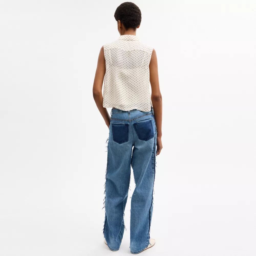Korte mouwloze blouse