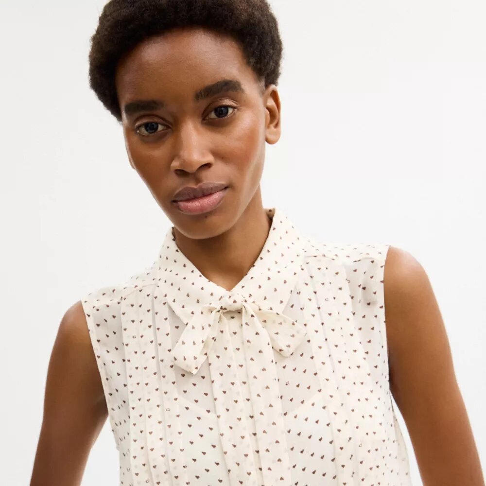 Korte mouwloze blouse