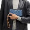 Lange portemonnee met rits rondom in kenmerkend denim