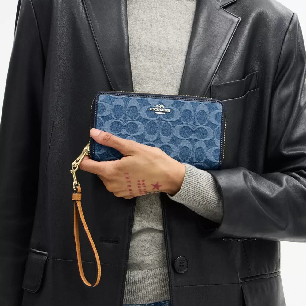 Lange portemonnee met rits rondom in kenmerkend denim