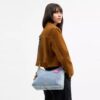 Laurel-schoudertas in Loved Denim met bedels