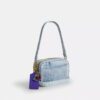 Mini Carey-crossbodytas in ‘Loved Denim’ met bedels