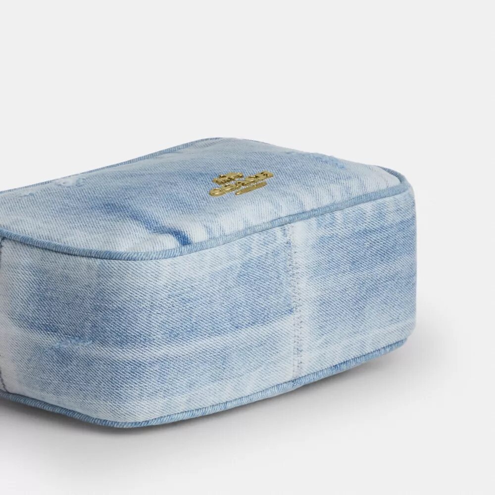 Mini Carey-crossbodytas in ‘Loved Denim’ met bedels