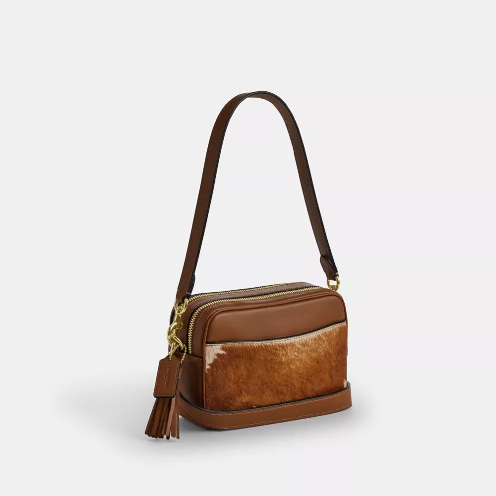 Mini Carey-crossbodytas van haarkalfsleer met koeienprint
