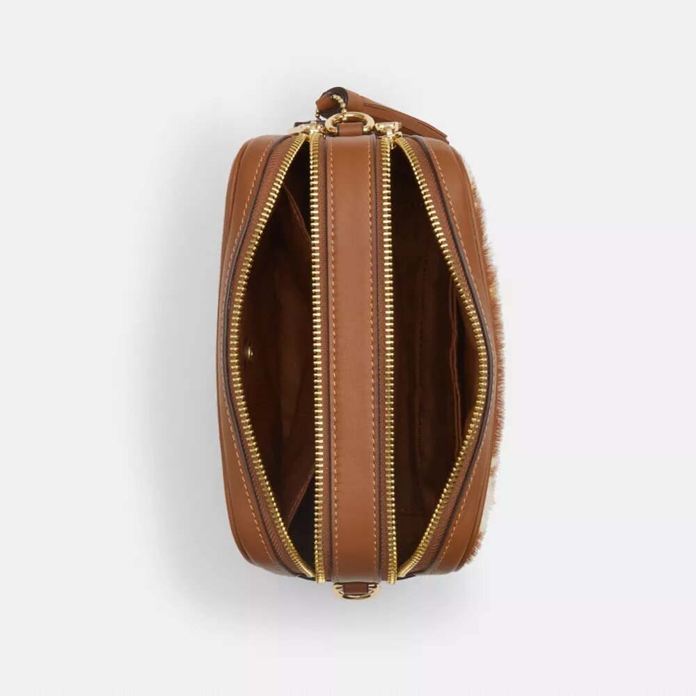Mini Carey-crossbodytas van haarkalfsleer met koeienprint