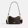 Mini Carey Crossbodytas van Signature Canvas